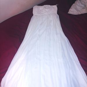 Strapless empire waist flowing gown